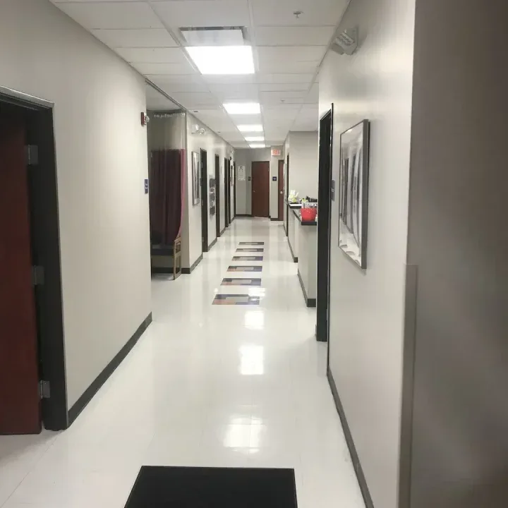 Hallway and examination-room entrances at Warren Urgent Care